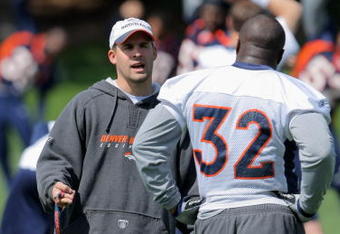 ENGLEWOOD, CO - MAY 03:  Head coach Josh McDaniels of the Denver Broncos chats with running back LaMont Jordan #32 during minicamp at the Broncos training facility on May 3, 2009 in Englewood, Colorado.  (Photo by Doug Pensinger/Getty Images)