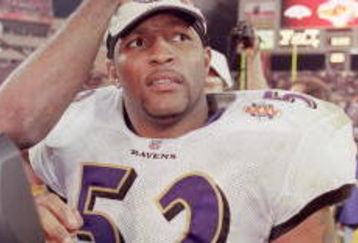 28 Jan 2001:  Ray Lewis #52 of the Baltimore Ravens gets congradulated after the Super Bowl XXXV Game against the New York Giants at the Raymond James Stadium in Tampa, Florida. The Ravens defeated the Giants 34-7.Mandatory Credit: Andy Lyons  /Allsport