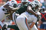 MIAMI - SEPTEMBER 07:  Calvin Pace #97 of the New York Jets sacks Chad Pennington #10 of the Miami Dolphins at Dolphin Stadium on September 7, 2008 in Miami, Florida.  (Photo by Doug Benc/Getty Images)