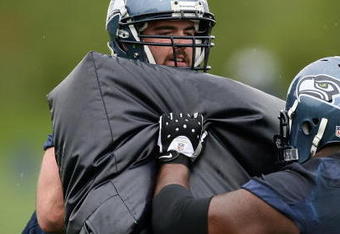 RENTON, WA - MAY 02:  Max Unger #60 (L) of the Seattle Seahawks  battles Mansfield Wrotto #66 during minicamp at the Seahawks' training facility on May 2, 2009 in Renton, Washington. (Photo by Otto Greule Jr/Getty Images)
