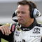 CONCORD, NC - MAY 21: Robby Gordon, driver of the #7 Jim Beam/Operation Home Front Toyota, stands on pit road during qualifying for the NASCAR Sprint Cup Series Coca-Cola 600 on May 21, 2009 at Lowe's Motor Speedway in Concord, North Carolina.  (Photo by John Harrelson/Getty Images)
