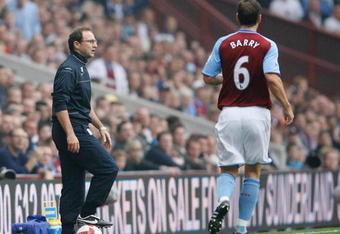BIRMINGHAM, UNITED KINGDOM - AUGUST 31:  Aston Villa Manager Martin O'Neill watches the action as Gareth Barry of Aston Villa looks on during the Barclays Premier League match between Aston Villa and Liverpool at Villa Park on August 31, 2008 in Birmingham, England.  (Photo by Getty Images)