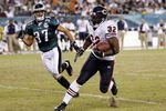 PHILADELPHIA - OCTOBER 21: Cedric Benson #32 of the Chicago Bears carries the ball against Sean Considine #37 the Philadelphia Eagles at Lincoln Financial Field October 21, 2007 in Philadelphia, Pennsylvania. (Photo by Kevin C. Cox/Getty Images)