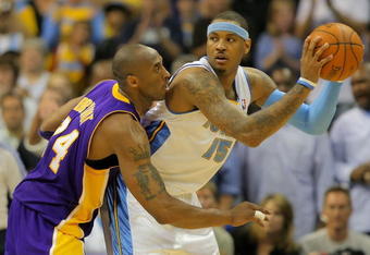 DENVER - MAY 25:  Carmelo Anthony #15 of the Denver Nuggets is guarded by Kobe Bryant #24 of the Los Angeles Lakers in Game Four of the Western Conference Finals during the 2009 NBA Playoffs at Pepsi Center on May 25, 2009 in Denver, Colorado. NOTE TO USER: User expressly acknowledges and agrees that, by downloading and or using this photograph, User is consenting to the terms and conditions of the Getty Images License Agreement.  (Photo by Doug Pensinger/Getty Images)