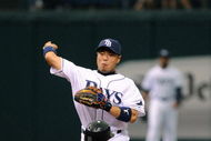 ST. PETERSBURG, FL - APRIL 19: Infielder Akinori Iwamura #1 of the Tampa Bay Rays throws to first base for a double play against the Chicago White Sox April 19, 2009 at Tropicana Field in St. Petersburg, Florida.  (Photo by Al Messerschmidt/Getty Images)