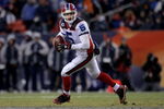 DENVER - DECEMBER 21:  Quarterback Trent Edwards #5 of the Buffalo Bills rolls out and looks for a receiver against the Denver Broncos during NFL action at Invesco Field at Mile High on December 21, 2008 in Denver, Colorado. The Bills defeated the Broncos 30-23.  (Photo by Doug Pensinger/Getty Images)