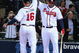 ATLANTA - MARCH 31: Catcher Brian McCann #16 of the Atlanta Braves is congratulated by right fielder Jeff Francoeur #7 after McCann's home run during the game against the Pittsburgh Pirates at Turner Field March 31, 2008 in Atlanta, Georgia.  The Pirates beat the Braves 12-11 in 12 innings. (Photo by Mike Zarrilli/Getty Images)