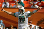 MIAMI, FL - JANUARY 4:  Quarterback Chad Pennington #10 of the Miami Dolphins directs play against the Baltimore Ravens during their AFC Wild Card Game at Dolphins Stadium on January 4, 2009 in Miami, Floirda.  (Photo by Al Messerschmidt/Getty Images)