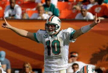 MIAMI, FL - JANUARY 4:  Quarterback Chad Pennington #10 of the Miami Dolphins directs play against the Baltimore Ravens during their AFC Wild Card Game at Dolphins Stadium on January 4, 2009 in Miami, Floirda.  (Photo by Al Messerschmidt/Getty Images)