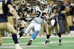 ST. LOUIS - JANUARY10:  Wide receiver Steve Smith #89 of the Carolina Panthers runs with the ball past cornerback Jason Sehorn #42 of the St. Louis Rams during the NFC Divisional Playoff game on January 10, 2004 at the Edward Jones Dome in St. Louis, Missouri. The Panthers defeated the Rams 29-23 to advance to the NFC Championship Game. (Photo by Jeff Gross/Getty Images)