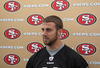 SANTA CLARA, CA - MAY 01:  Quarterback Alex Smith #11 of the San Francisco 49ers talks with the media during the 49ers Minicamp at their training facilities on May 1, 2009 in Santa Clara, California.  (Photo by Jed Jacobsohn/Getty Images)