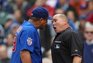 CHICAGO - MAY 27: Carlos Zambrano #38 of the Chicago Cubs argues with home plate umpire Mark Carlson #48 after a play at the plate in the 7th inning with Zambrano and Nyjer Morgan of the Pittsburgh Pirates on May 27, 2009 at Wrigley Field in Chicago, Illinois. The Cubs defeated the Pirates 5-2. (Photo by Jonathan Daniel/Getty Images)