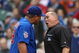 CHICAGO - MAY 27: Carlos Zambrano #38 of the Chicago Cubs argues with home plate umpire Mark Carlson #48 after a play at the plate in the 7th inning with Zambrano and Nyjer Morgan of the Pittsburgh Pirates on May 27, 2009 at Wrigley Field in Chicago, Illinois. The Cubs defeated the Pirates 5-2. (Photo by Jonathan Daniel/Getty Images)