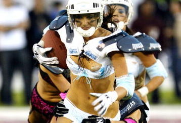 LOS ANGELES, CA - FEBRUARY 1:  Action from the Team Dream and Team Euphoria First Annual Lingerie Bowl, presented by PartyPoker.com, at the Los Angeles Coliseum on February 1st, 2004 in Los Angeles, California. (Photo by Frazer Harrison/Getty Images For Horizon Productions) 