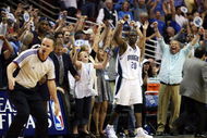 ORLANDO, FL - MAY 26:  Mickael Pietrus #20 of the Orlando Magic and fans celebrate their 116-114 victory over the Cleveland Cavaliers in Game Four of the Eastern Conference Finals during the 2009 NBA Playoffs at the Amway Arena on May 26, 2009 in Orlando, Florida. NOTE TO USER: User expressly acknowledges and agrees that, by downloading and or using this photograph, User is consenting to the terms and conditions of the Getty Images License Agreement.  (Photo by Elsa/Getty Images)