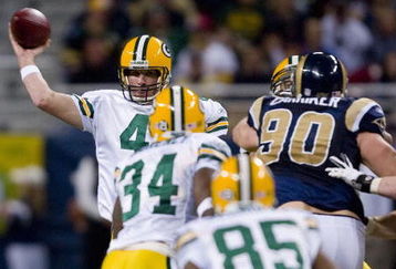 ST. LOUIS, MO - DECEMBER 16: Brett Favre #4 of the Green Bay Packers passes against the St. Louis Rams at the Edward Jones Dome December 16, 2007 in St. Louis, Missouri.  The Packers beat the Rams 33-14.  (Photo by Dilip Vishwanat/Getty Images)