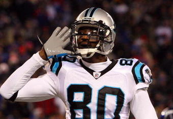 EAST RUTHERFORD, NJ - DECEMBER 21: Wide receiver Dwayne Jarrett #80 of the Carolina Panthers celebrates after a play against the New York Giantson December 21, 2008 at Giants Stadium in East Rutherford, New Jersey.  (Photo by Jim McIsaac/Getty Images)