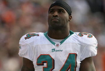 DENVER - NOVEMBER 02:  Running back Ricky Williams #34 of the Miami Dolphins awaits action against the Denver Broncos during NFL action at Invesco Field at Mile High on November 2, 2008 in Denver, Colorado. The Dolphins defeated the Broncos 26-17.  (Photo by Doug Pensinger/Getty Images)