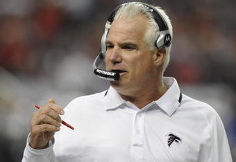 ATLANTA - DECEMBER 14:  Coach Mike Smith of the Atlanta Falcons directs play against the Tampa Bay Buccaneers  at the Georgia Dome on December 14, 2008 in Atlanta, Georgia.  (Photo by Al Messerschmidt/Getty Images) 