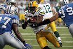 DETROIT - SEPTEMBER 14:  Ryan Grant #25 of the Green Bay Packers runs the ball during the Green Bay Packers vs. Detroit Lions on September 14, 2008 at Ford Field in Detroit, Michigan.  (Photo by Domenic Centofanti/Getty Images)