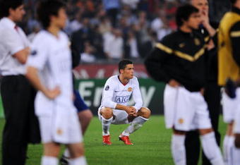 ROME - MAY 27:  Cristiano Ronaldo of Manchester United reacts after Barcelona won the UEFA Champions League Final match between Barcelona and Manchester United at the Stadio Olimpico on May 27, 2009 in Rome, Italy. Barcelona won 2-0.  (Photo by Shaun Botterill/Getty Images)