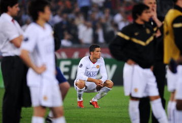 ROME - MAY 27:  Cristiano Ronaldo of Manchester United reacts after Barcelona won the UEFA Champions League Final match between Barcelona and Manchester United at the Stadio Olimpico on May 27, 2009 in Rome, Italy. Barcelona won 2-0.  (Photo by Shaun Botterill/Getty Images)