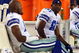 PHILADELPHIA - DECEMBER 28:  Roy Williams #11 and Terrell Owens #81 of the Dallas Cowboys sit on the bench late in the game against the Philadelphia Eagles on December 28, 2008 at Lincoln Financial Field in Philadelphia, Pennsylvania. The Eagles defeated the Cowboys 44-6.  (Photo by Jim McIsaac/Getty Images)