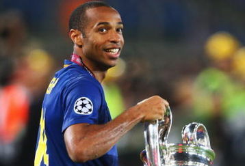 ROME - MAY 27:  Thierry Henry of Barcelona holds the trophy as he celebrates winning the UEFA Champions League Final match between Manchester United and Barcelona at the Stadio Olimpico on May 27, 2009 in Rome, Italy.  (Photo by Laurence Griffiths/Getty Images)