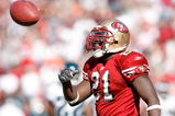 SAN FRANCISCO - OCTOBER 12:  Running back Frank Gore #21 of the San Francisco 49ers celebrates a 6-yard touchdown run against the Philadelphia Eagles during their game on October 12, 2008 at Candlestick Park in San Francisco, California. Philadelphia won 40-26.  (Photo by Greg Trott/Getty Images)