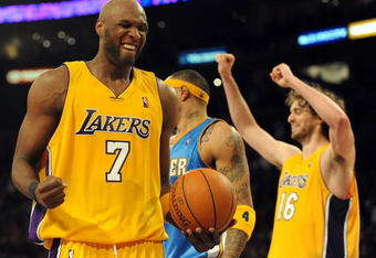LOS ANGELES, CA - MAY 27:  Lamar Odom #7 of the Los Angeles Lakers reacts alongside teammate Pau Gasol #16 in the fourth quarter against the Denver Nuggets in Game Five of the Western Conference Finals during the 2009 NBA Playoffs at Staples Center on May 27, 2009 in Los Angeles, California. NOTE TO USER: User expressly acknowledges and agrees that, by downloading and or using this photograph, User is consenting to the terms and conditions of the Getty Images License Agreement.  (Photo by Harry How/Getty Images)