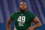 INDIANAPOLIS, IN - FEBRUARY 23:  Defensive lineman Terrance Taylor of Michigan runs the 40 yard dash during the NFL Scouting Combine presented by Under Armour at Lucas Oil Stadium on February 23, 2009 in Indianapolis, Indiana. (Photo by Scott Boehm/Getty Images)