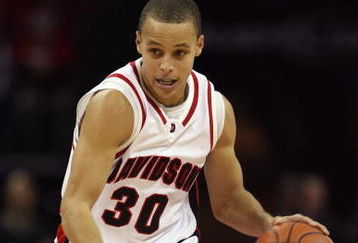 CHARLOTTE, NC - DECEMBER 6:  Stephen Curry #30 of the Davidson Wildcats drives during the game against the North Carolina State Wolfpack at Time Warner Cable Arena on December 6, 2008 in Charlotte, North Carolina. (Photo by Streeter Lecka/Getty Images)
