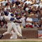 12 Sep 1998:  Sammy Sosa #21 of the Chicago Cubs hits his 60th home run during the game against the Milwaukee Brewers at Wrigley Field in Chicago, Illinois. The Cubs defeated the Brewers 15-12. Mandatory Credit: Tim Brokema  /Allsport
