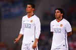 ROME - MAY 27:  Carlos Tevez of Manchester United and Cristiano Ronaldo of Manchester United look dejected after Barcelona won the UEFA Champions League Final match between Barcelona and Manchester United at the Stadio Olimpico on May 27, 2009 in Rome, Italy. Barcelona won 2-0.  (Photo by Laurence Griffiths/Getty Images)