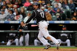 DENVER - MAY 10:  Todd Helton #17 of the Colorado Rockies watches his RBI double off of starting pitcher Chris Volstad #41 of the Florida Marlins that scored Aaron Cook in the sixth inning during MLB action at Coors Field on May 10, 2009 in Denver, Colorado.  (Photo by Doug Pensinger/Getty Images)