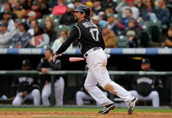 DENVER - MAY 10:  Todd Helton #17 of the Colorado Rockies watches his RBI double off of starting pitcher Chris Volstad #41 of the Florida Marlins that scored Aaron Cook in the sixth inning during MLB action at Coors Field on May 10, 2009 in Denver, Colorado.  (Photo by Doug Pensinger/Getty Images)