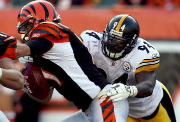 CINCINNATI - OCTOBER 19:  Lawrence Timmons #94 of the Pittsburgh Steelers sacks Ryan Fitzpatrick #11 of the Cincinnati Bengals during the NFL game at Paul Brown Stadium on October 19, 2008 in Cincinnati, Ohio.  (Photo by Andy Lyons/Getty Images)