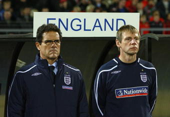 MINSK, BELARUS - OCTOBER 15:  Fabio Capello the manager of England and Stuart Pearce the coach look on before the FIFA2010 World Cup Qualifying match between Belarus and England at the Dinamo Stadium on October 15, 2008 in Minsk, Belarus.  (Photo by Alex Livesey/Getty Images)