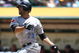 OAKLAND, CA - MAY 10: Jose Baustista #23 of the Toronto Blue Jays bats against the Oakland Athletics during a Major League Baseball game on May 10, 2009 at the Oakland Coliseum in Oakland, California. (Photo by Jed Jacobsohn/Getty Images)