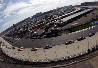 DOVER, DE - SEPTEMBER 21:  Clint Bowyer, driver of the #07 Jack Daniel's Chevrolet leads a pack of cars during the NASCAR Sprint Cup Series Camping World RV 400 at Dover International Speedway on September 21, 2008 in Dover, Delaware.  (Photo by Chris Graythen/Getty Images)