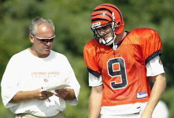 GEORGETOWN, KY - JULY 28:  Quarterback Carson Palmer #9 and offensive coordinator Bob Bratkowski of the Cincinnati Bengals talk during training camp at Georgetown College on July 28, 2003 in Georgetown, Kentucky. (Photo by Andy Lyons/Getty Images)