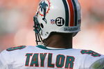 MIAMI - DECEMBER 2:  Jason Taylor #99 of the Miami Dolphins displays Sean Talyors #21 on his helmet during the NFL game against the New York Jets at the Dolphin Stadium on December 2, 2007 in Miami, Florida. (Photo by Doug Benc/Getty Images)