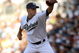 SAN DIEGO - APRIL 06:  Pitcher Jake Peavy #44 of the San Diego Padres throws a pitch against the Los Angeles Dodgers on April 6, 2009 at Petco Park in San Diego, California.  The Dodgers won 4-1.  (Photo by Stephen Dunn/Getty Images)