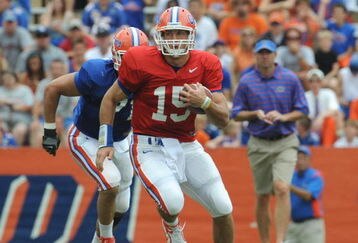 GAINESVILLE, FL - APRIL 18: Quarterback Tim Tebow #15 of the University of Florida rushes upfield during the spring football Orange and Blue game April 18, 2009 at Ben Hill Griffin Stadium in Gainesville, Florida.  (Photo by Al Messerschmidt/Getty Images)
