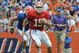 GAINESVILLE, FL - APRIL 18: Quarterback Tim Tebow #15 of the University of Florida rushes upfield during the spring football Orange and Blue game April 18, 2009 at Ben Hill Griffin Stadium in Gainesville, Florida.  (Photo by Al Messerschmidt/Getty Images)