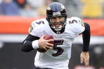 CINCINNATI - NOVEMBER 30:  Quarterback Joe Flacco #5 of the Baltimore Ravens runs with the ball during their NFL game against the Cincinnati Bengals on November 30, 2008 at Paul Brown Stadium in Cincinnati, Ohio. The Ravens defeated the Bengals 34-3.(Photo by Andy Lyons/Getty Images)