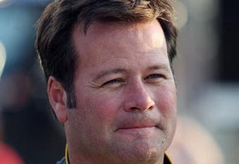 DARLINGTON, SC - MAY 09:  Robby Gordon, driver of the #7 Robby Gordon Motorsport Toyota, stands near his car before the NASCAR Sprint Cup Series Southern 500 on May 9, 2009 at Darlington Raceway in Darlington, South Carolina.  (Photo by Elsa/Getty Images for NASCAR)