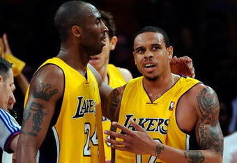 LOS ANGELES, CA - MAY 27:  (L-R) Kobe Bryant #24 and Shannon Brown #12 of the Los Angeles Lakers look on in the fourth quarter against the Denver Nuggets in Game Five of the Western Conference Finals during the 2009 NBA Playoffs at Staples Center on May 27, 2009 in Los Angeles, California. NOTE TO USER: User expressly acknowledges and agrees that, by downloading and or using this photograph, User is consenting to the terms and conditions of the Getty Images License Agreement.  (Photo by Kevork Djansezian/Getty Images)
