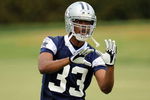 IRVING, TX - MAY 01:  Cornerback Mike Mickens #33 of the Dallas Cowboys runs the ball during rookie mini camp on May 1, 2009 in Irving, Texas.  (Photo by Ronald Martinez/Getty Images)