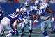 4 Oct 1997:  Emmitt Smith #22 of the Dallas Cowboys runs with the ball  as teammate Larry Allen #73 sets up to block Corey Widmer #90 of the New York Giants during a game at the Meadowlands in East Rutherford, New Jersey. The Giants defeated the Cowboys 2